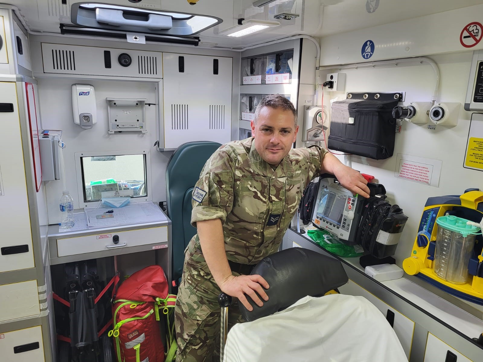 Corporal inside an ambulance.